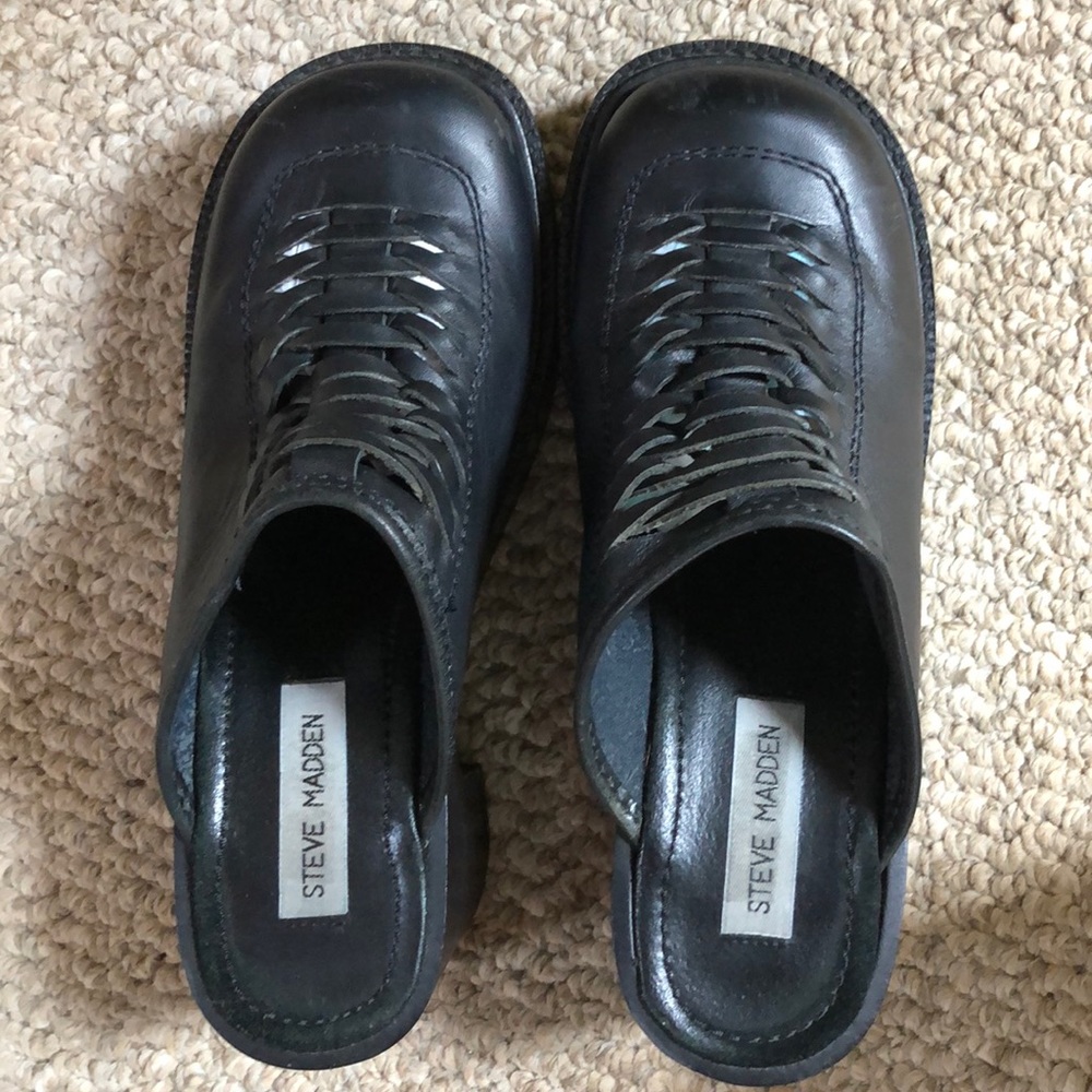 Steve Madden black platform clogs.